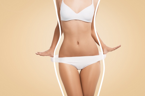 criolipólisis, el cuerpo de una mujer mostrando la reducción grasa, mostrando una figura ideal